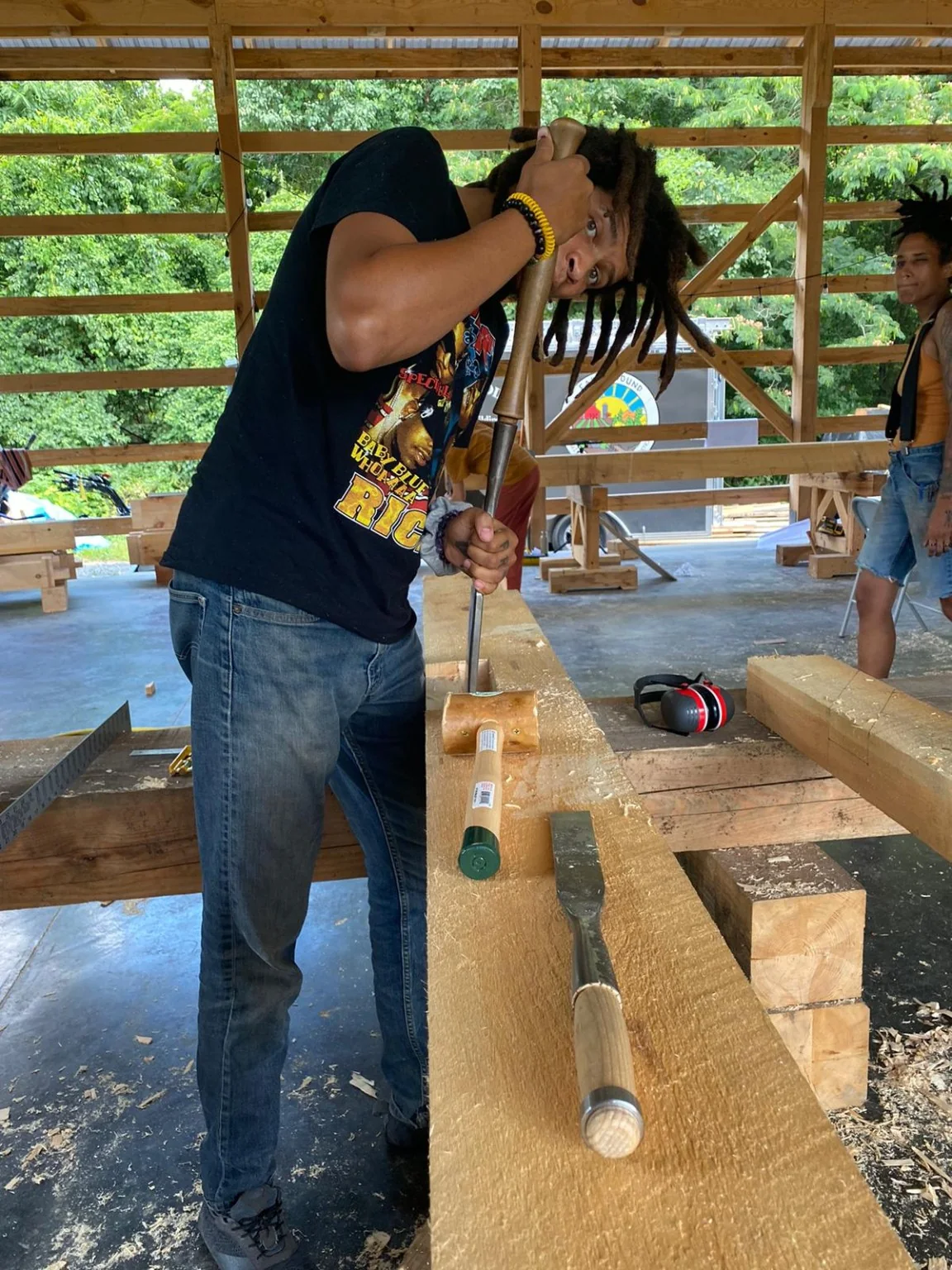 Dom chiseling a traditional timber-frame mortise