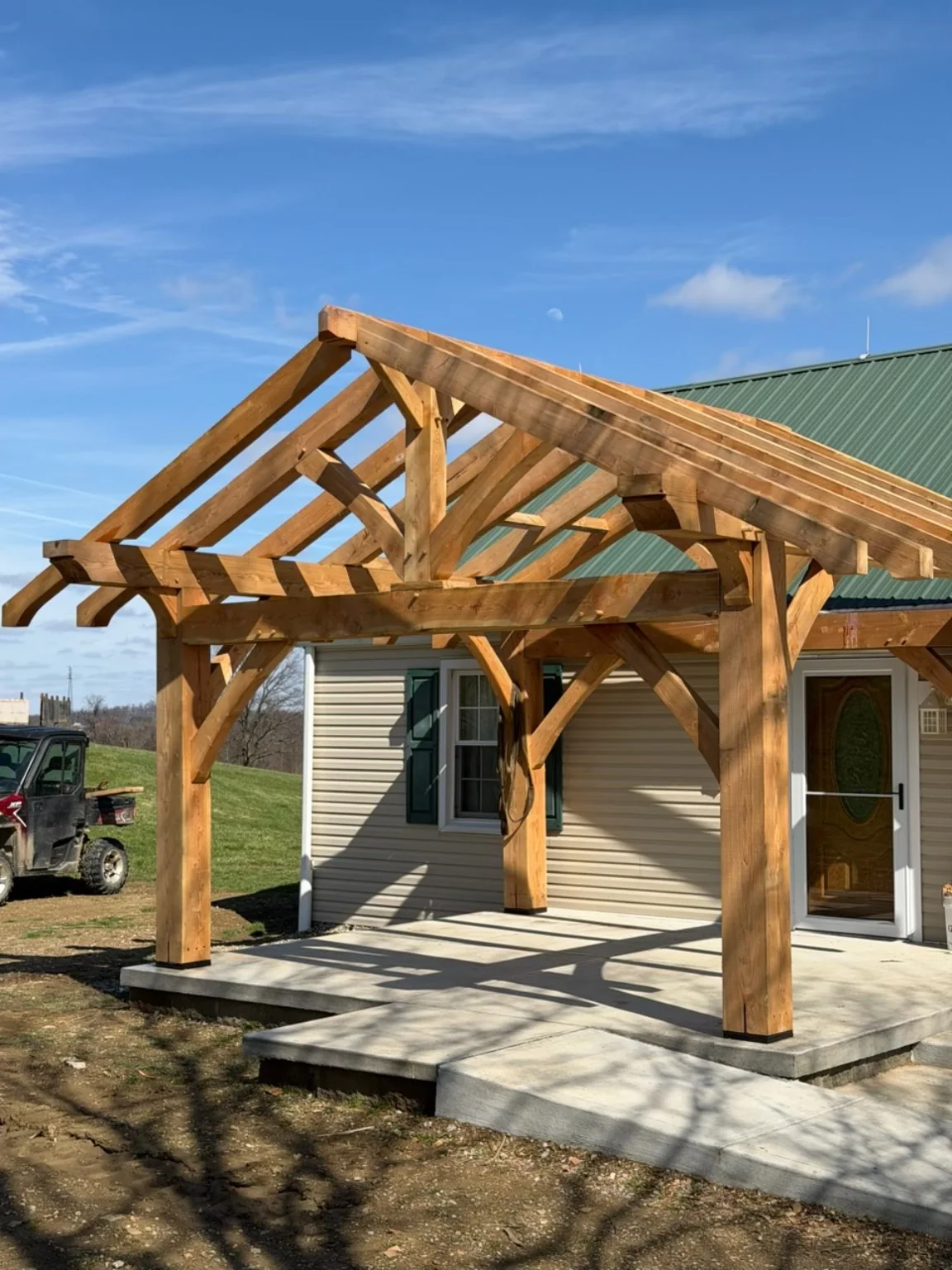 Completed hemlock timber-frame patio structure