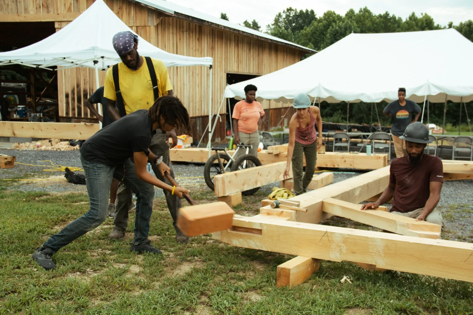 Pavilion timbers being assembled during timber framing class